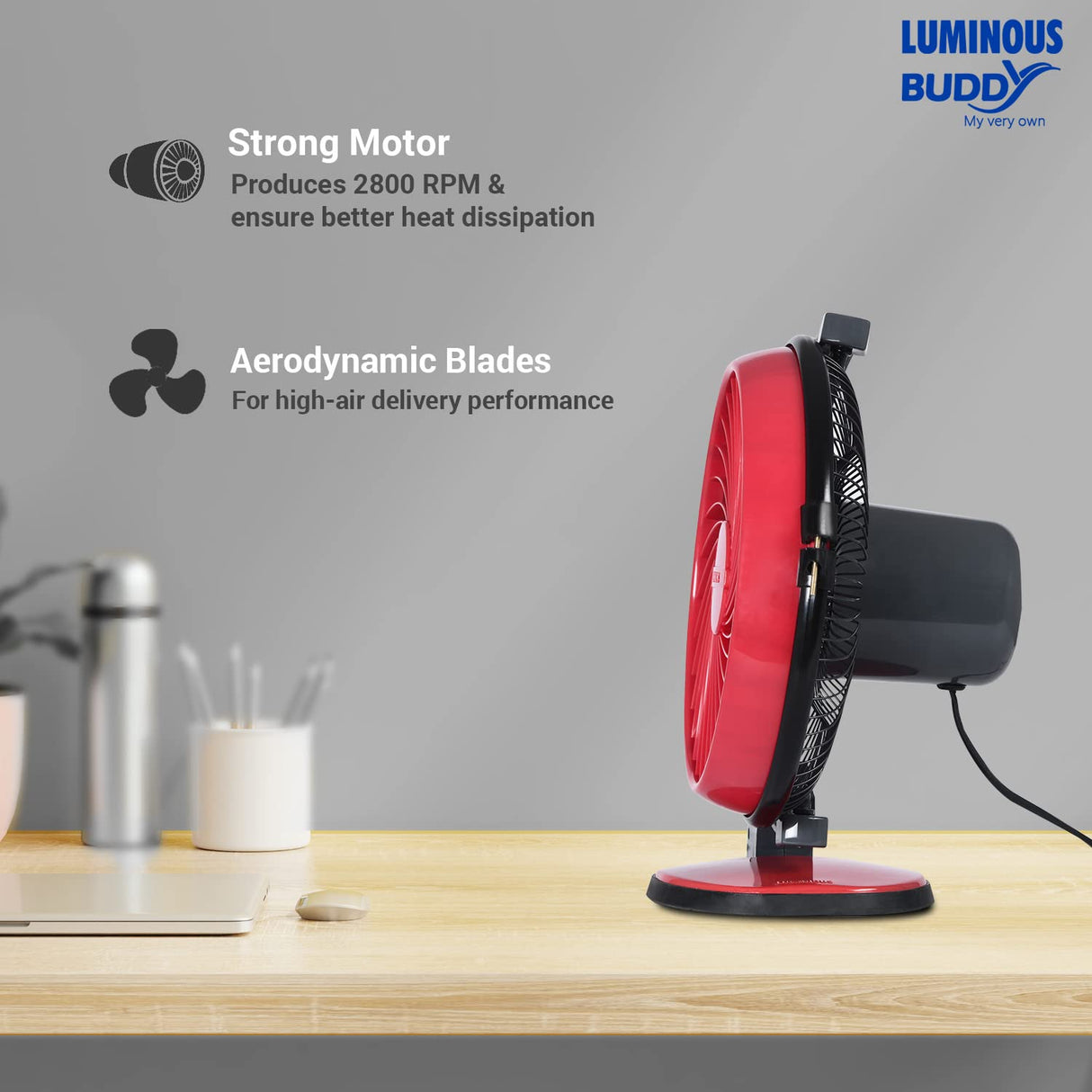 Red and black fan on a wooden surface with Luminous Buddy branding and product features.