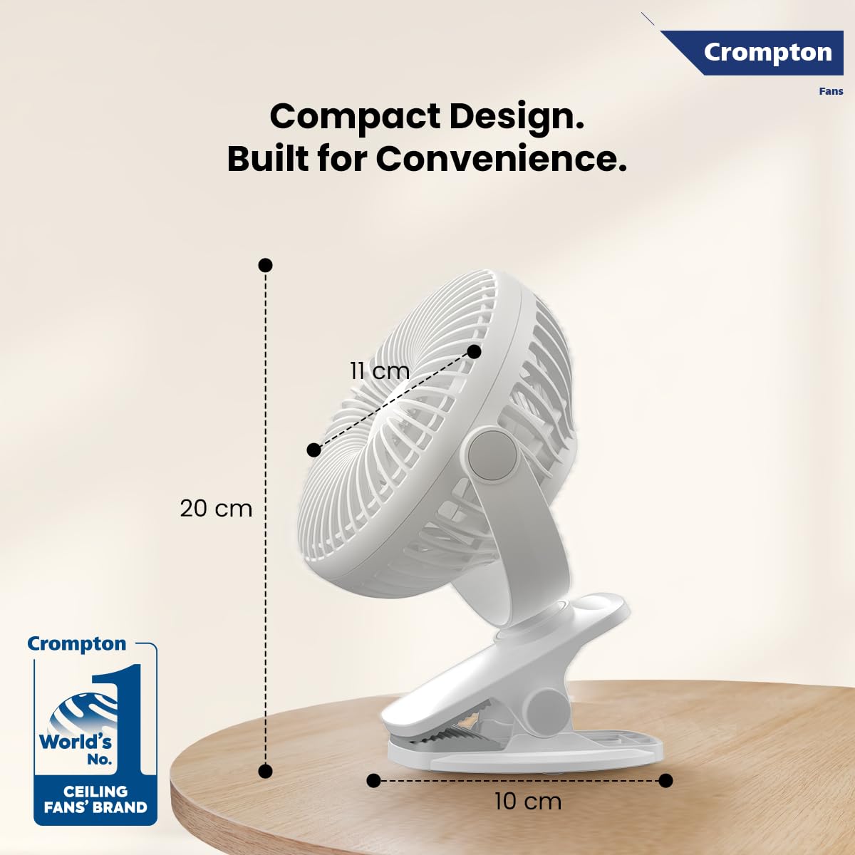 Crompton clip fan with dimensions on a light background