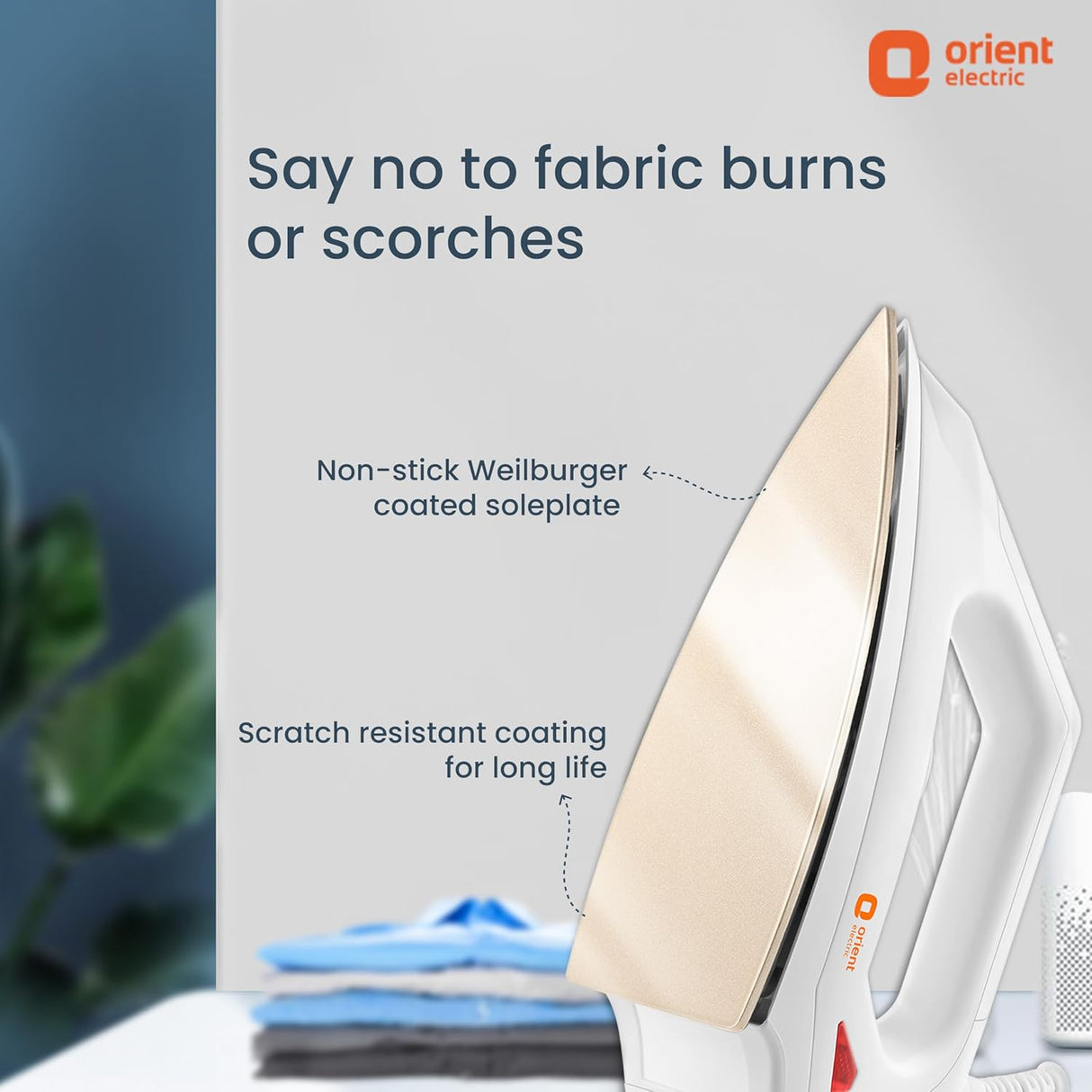 White iron with text about fabric care and Orient Electric branding