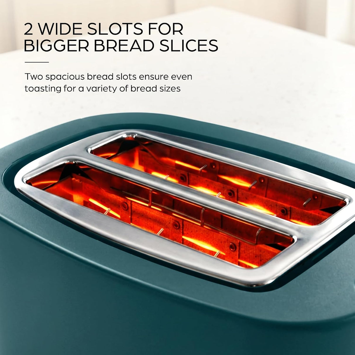 Close-up of a toaster with two wide slots and glowing heating elements, shown with marketing text that reads '2 WIDE SLOTS FOR BIGGER BREAD SLICES'.
