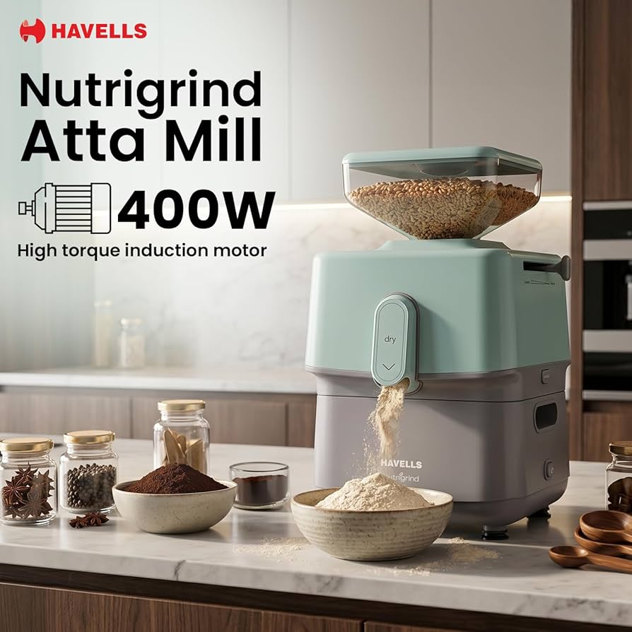 HAVELLS Nutrigrind Atta Mill on a kitchen counter with jars of spices and a bowl of flour.