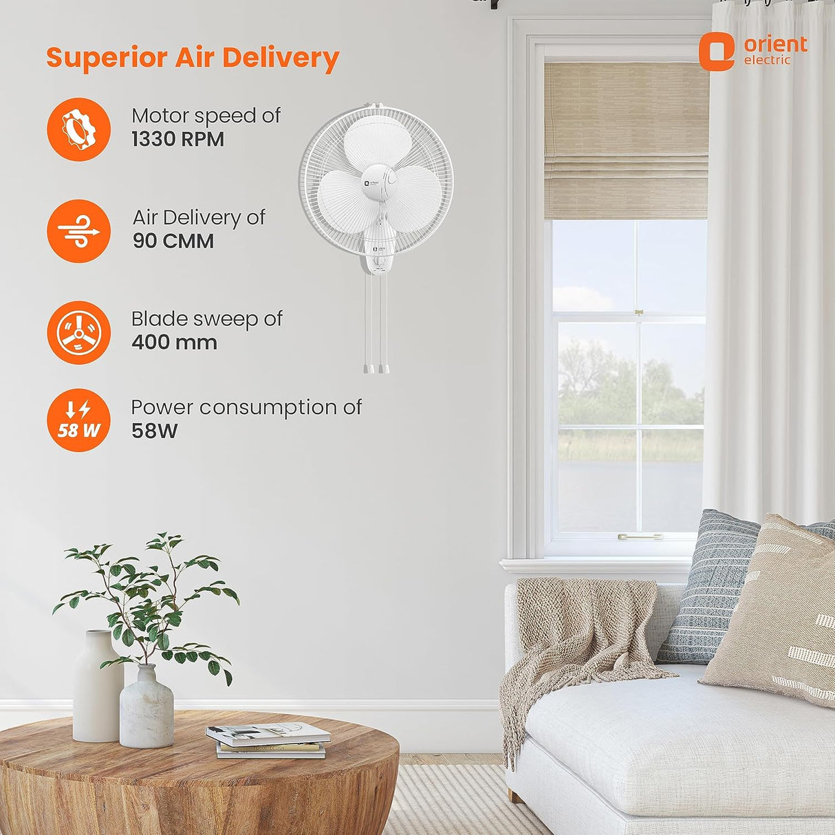 Wall-mounted fan in a living room with specifications displayed.