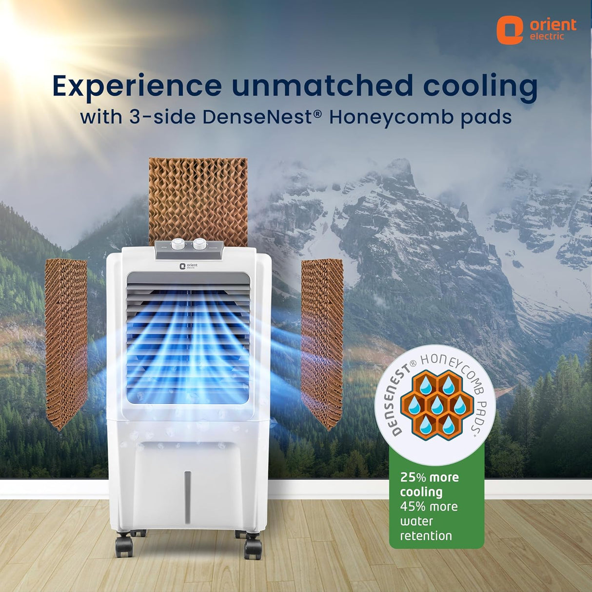 Air cooler with DenseNest Honeycomb pads against a mountainous background, featuring Orient Electric branding.