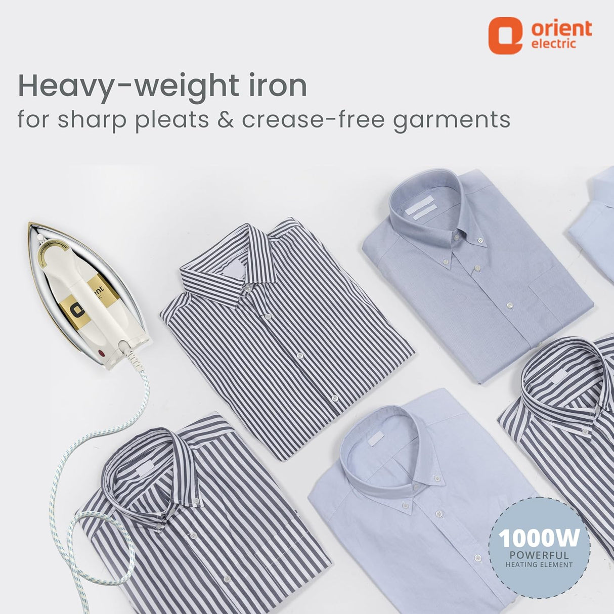 Iron and folded shirts on a white background with Orient Electric branding.