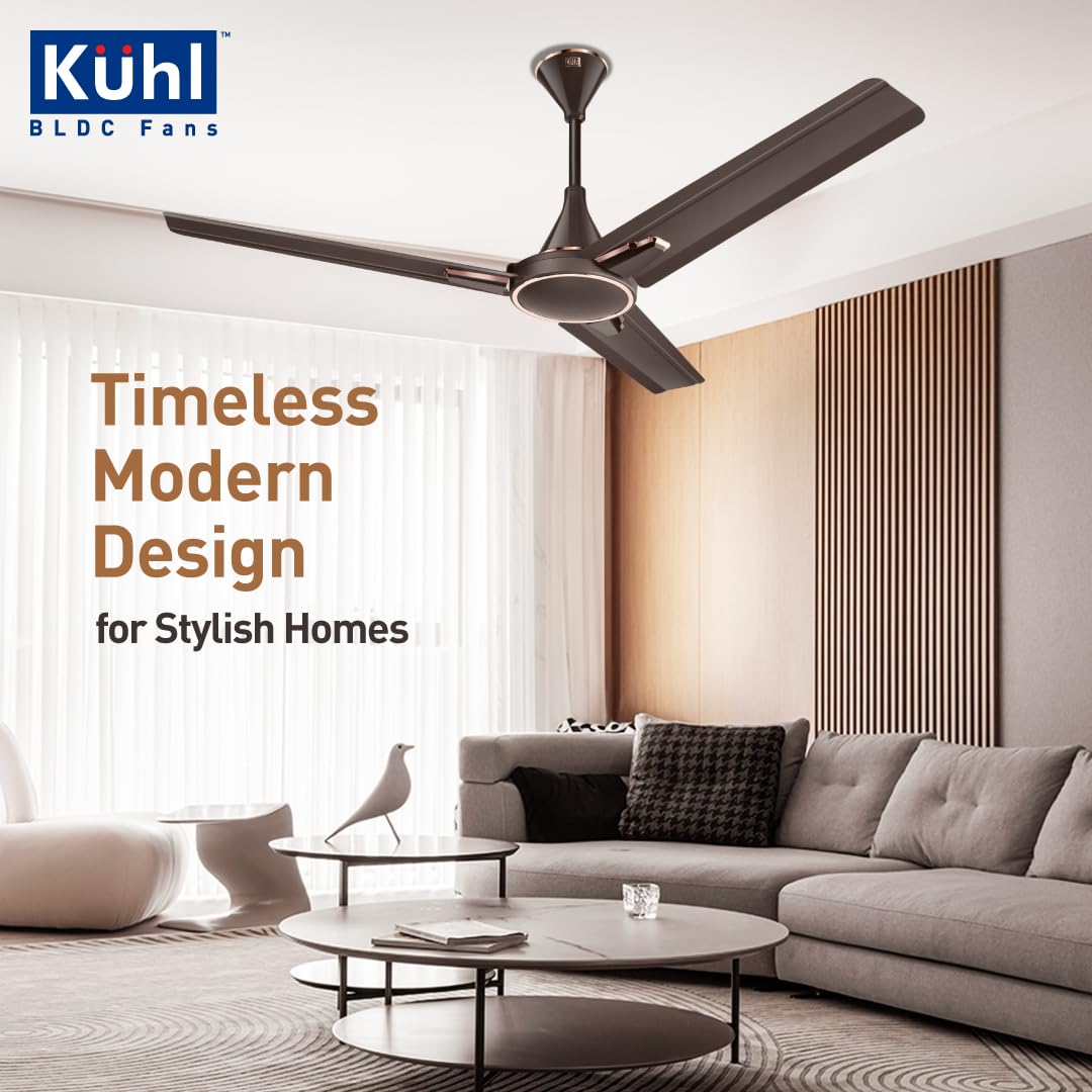 Modern living room with a ceiling fan, featuring Kühl BLDC Fans branding.