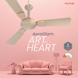 Ceiling fan with 'AeroGlam' branding on a pink background with furniture.