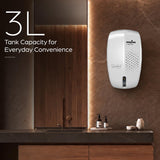 A KenStar Premium 3L wall-mounted dispenser shown in a modern bathroom setting with a dark countertop, wooden cabinets, and a textured brown wall. White text on the left reads '3L Tank Capacity for Everyday Convenience'.
