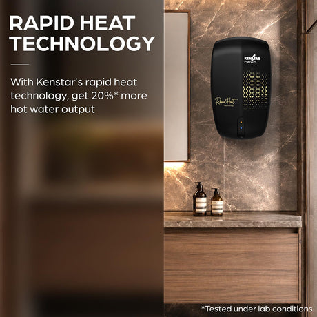 A black Kenstar hand dryer mounted on a brown marble bathroom wall above a wooden vanity, with promotional text on the left about rapid heat technology.