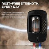 A black electric water heater with a visible copper coil inside a transparent jar-like chamber, shown against a smoky brown background with marketing text about rust-free strength and stainless steel construction.