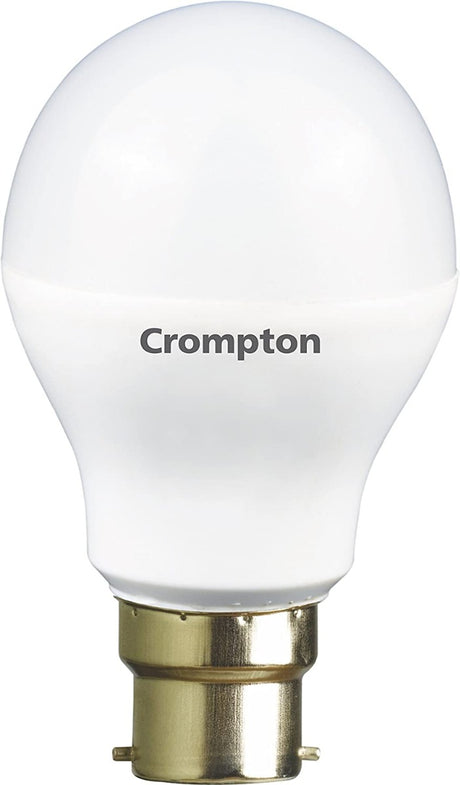 A white Crompton Dyna Ray 9W B22 LED bulb with a clear glass body and a brass base.