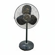 Black standing fan on a tiled floor with a white wall background