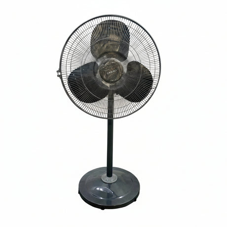 Black standing fan on a tiled floor with a white wall background