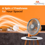 Orange fan with 'RR signature' branding on an orange background with text 'A Spin of Freshness for Your Space!'.