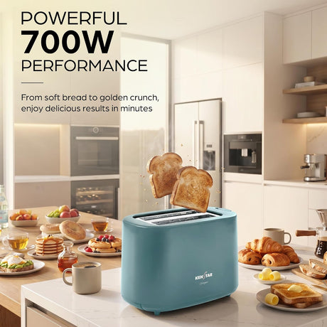 A light blue 4-slice toaster sits on a kitchen counter with two slices of toast popping out. The scene is set in a bright, modern kitchen with breakfast items on the counter, and promotional text in the upper left reads 'POWERFUL 700W PERFORMANCE'.