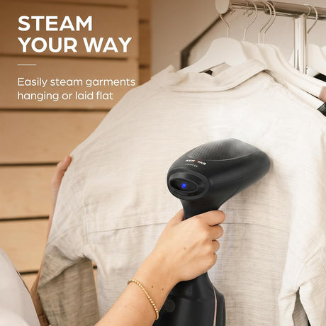 Easily steam garments can be hanged or laid flat . 