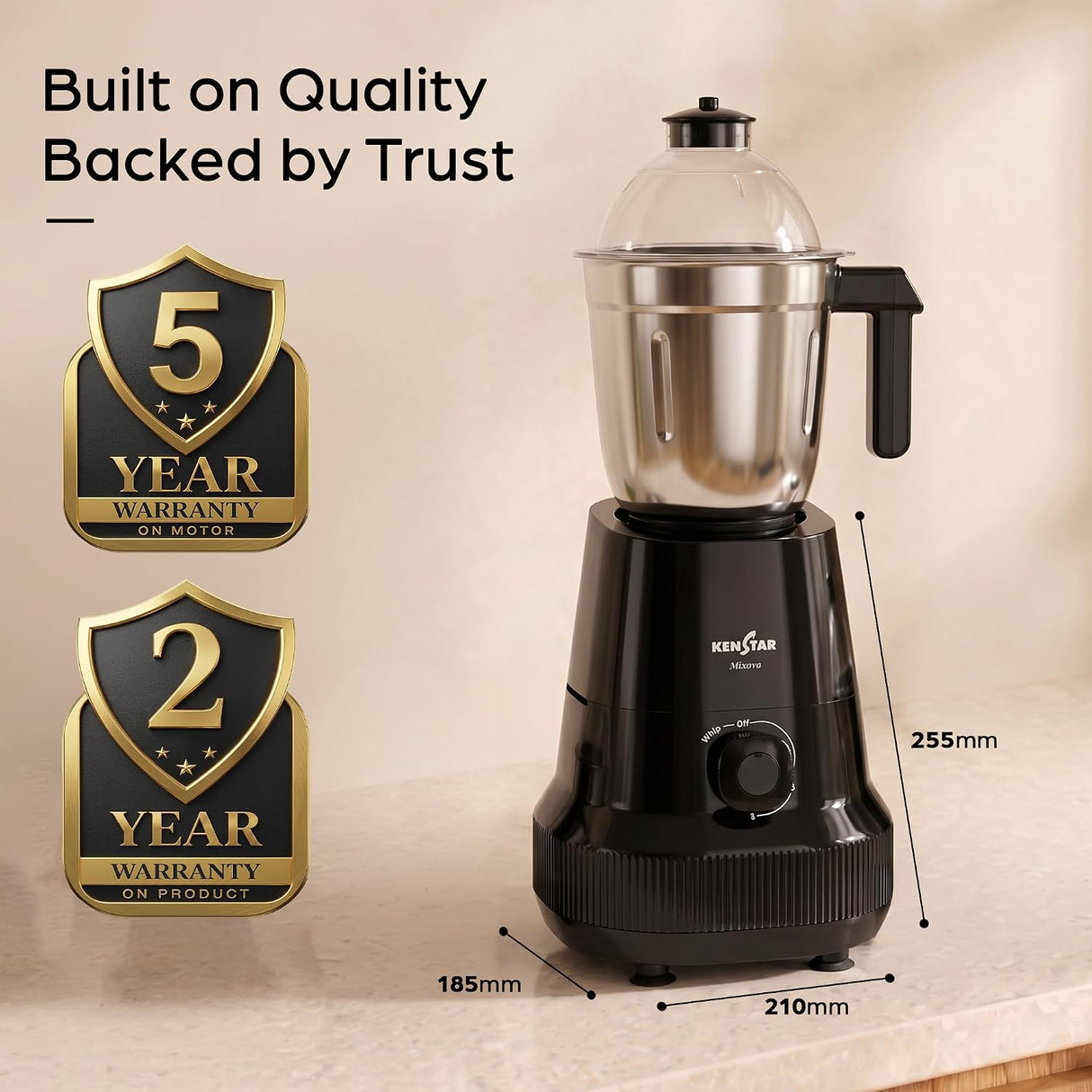 A KenStar countertop blender with a clear glass jar and stainless steel bowl on a black base, shown on a beige countertop with product dimensions and warranty badges overlaid.