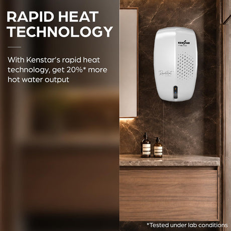 A Kenstar wall-mounted dispenser shown installed in a bathroom setting with a marble countertop and dark brown tiled wall. Text on the left highlights rapid heat technology.