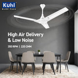 Ceiling fan with dining table and chairs in a room, featuring Kuhl BLDC Fans branding.