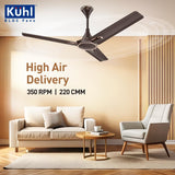 Ceiling fan in a living room with 'Kühl' branding and text about high air delivery.