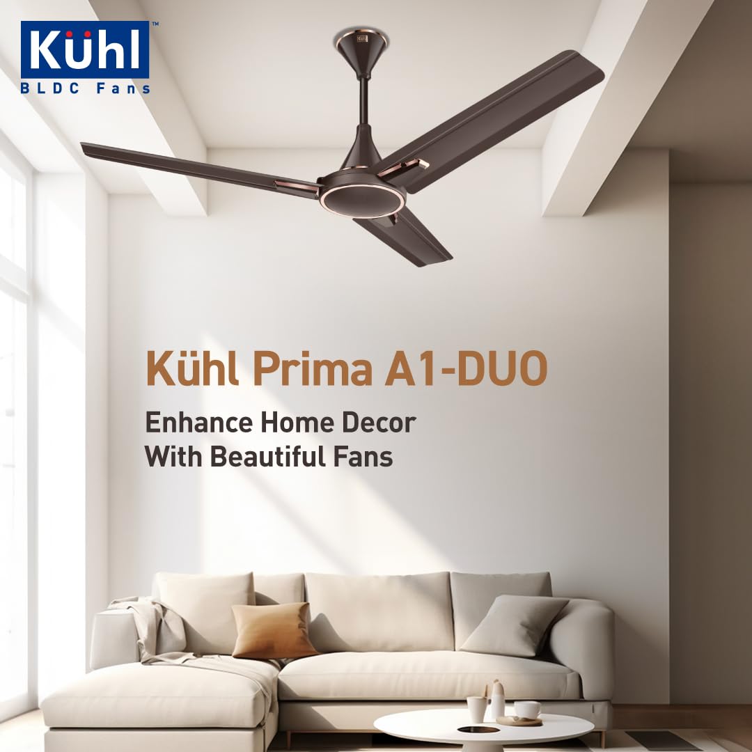 Kuhl Prima A1-DUO ceiling fan in a modern living room setting with a couch and coffee table.