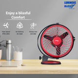 Red and black fan on a desk with Luminous branding and product features.