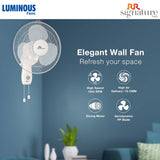 Luminous Fans wall fan on a blue wall with product features listed.