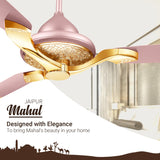 Pink and gold ceiling fan with Jaipur Mahal branding in a bedroom setting