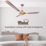 Ceiling fan with 'Jaipur Mahal' branding in a living room setting.