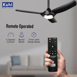Black ceiling fan with remote control in a living room setting, featuring Kuhl branding.