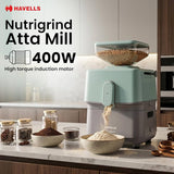 HAVELLS Nutrigrind Atta Mill on a kitchen counter with jars of spices and a bowl of flour.