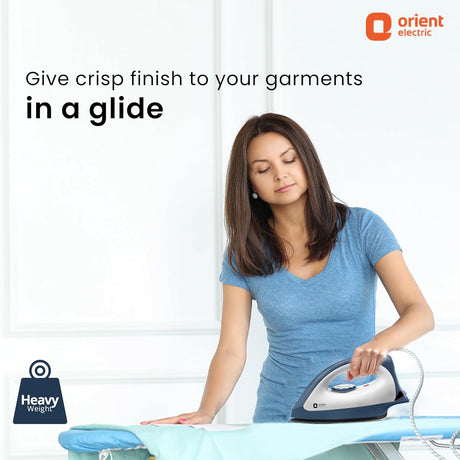 Woman ironing clothes with an Orient Electric iron on a white background