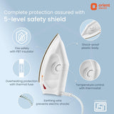 Dry iron with safety features on a light blue background, featuring Orient Electric branding.