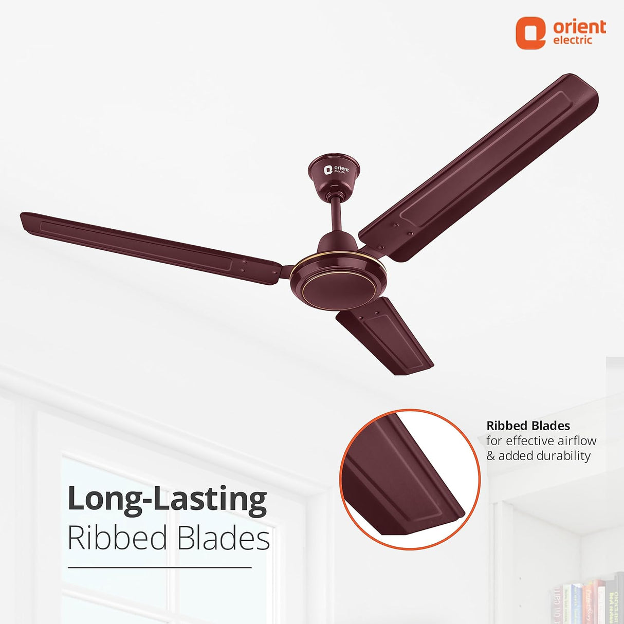 Ceiling fan with ribbed blades on a white background, featuring Orient Electric logo.
