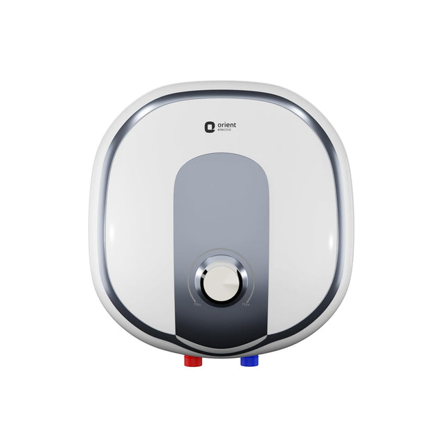 An electric water heater by Orient, featuring a white and silver rounded square design with a central gray panel and a central dial, shown against a plain white background.