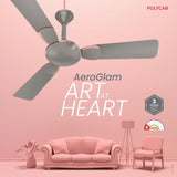 Ceiling fan with 'AeroGlam' branding on a pink background with furniture.