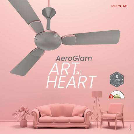 Ceiling fan with 'AeroGlam' branding on a pink background with furniture.