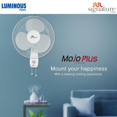 Wall-mounted fan with Luminous and RR Signature branding in a room setting.