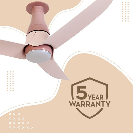 Pink ceiling fan with a 5-year warranty badge on a light beige background
