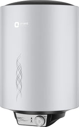 An Orient electric water heater with a sleek cylindrical design, featuring a brushed silver metallic body, a black top cap, and a black base housing a white control dial.