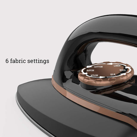 a crompton instaglide 750 watt dry iron has a feature of 6 fabric settings 