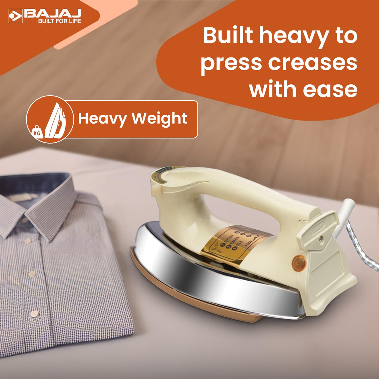 Bajaj iron with a shirt on a wooden surface, highlighting 'Heavy Weight' feature.