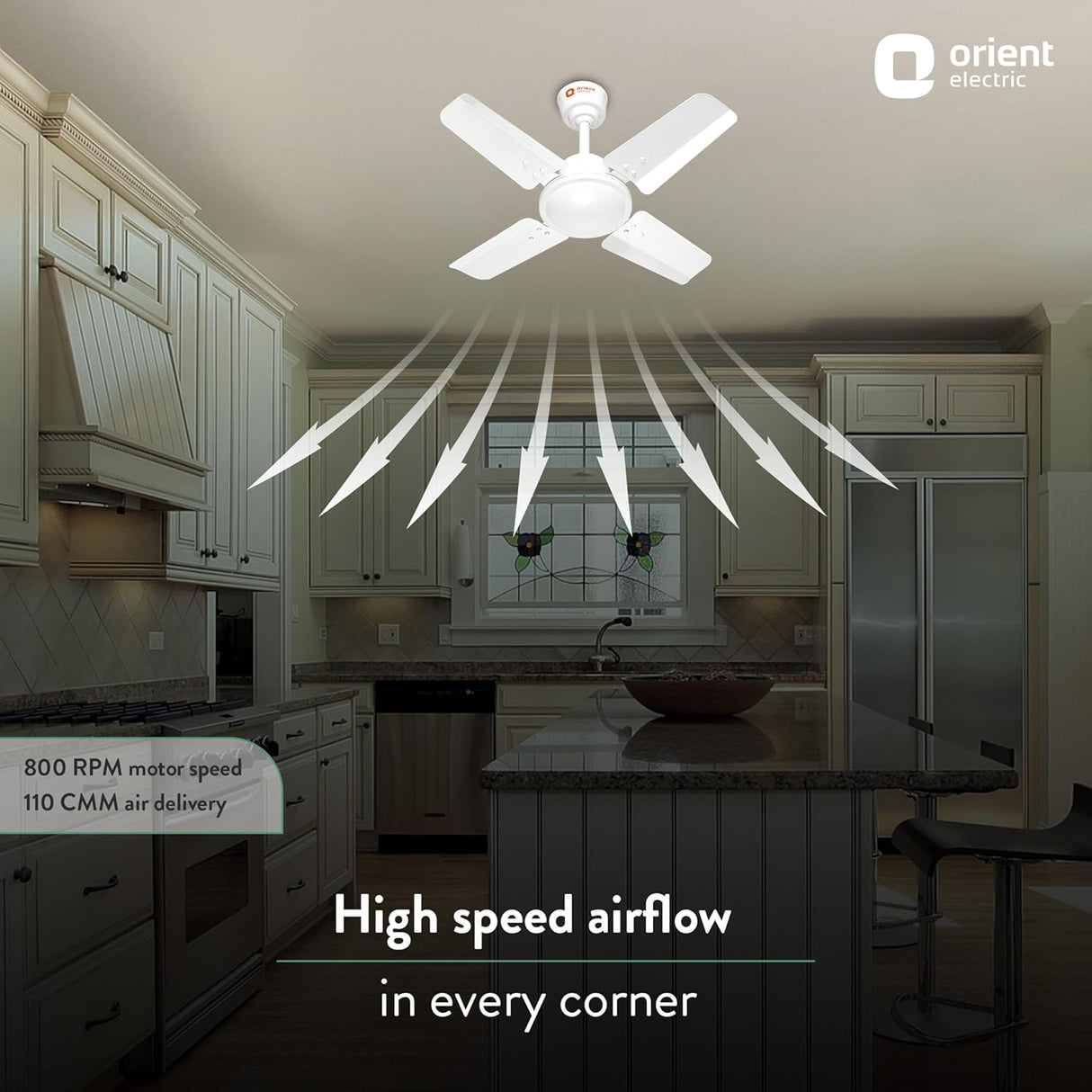 Ceiling fan in a kitchen with 'Orient Electric' branding, highlighting high-speed airflow.