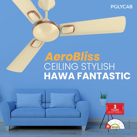 Ceiling fan with a blue wall and sofa in the background, featuring Polycab AeroBliss product.